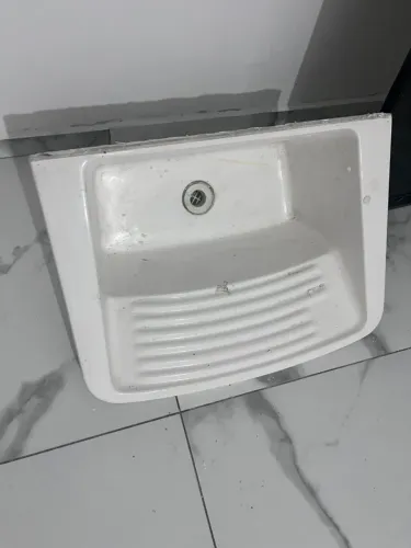 Tanque de lavar roupa para doação
