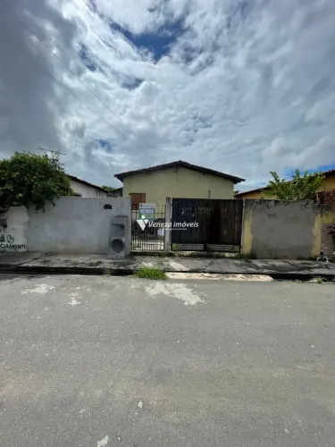 Terreno com casa construída próximo à Praça do Dirceu I Itararé