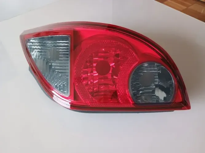LANTERNA TRASEIRA CELTA G2 2006 A 2015 LD FUMÊ ORIGINAL