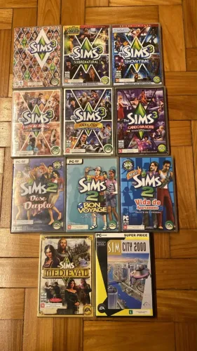 Lote de jogos The Sims 3, The Sims 2, The Sims Medieval e Sim City, Originais para PC. 