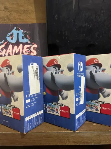 Nin Switch OLED LACRADO + MARIO WONDER E 1 ano Garantia.