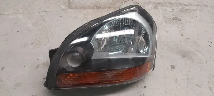 Farol esquerdo Hyundai Tucson 2006 a 2015