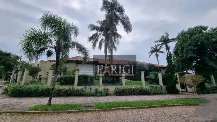 Casa com 3 dormitórios para alugar, 350 m² por R$ 21.000,00/mês - Vila Assunção - Porto Al