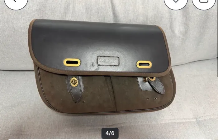 Bolsa triumph de couro 