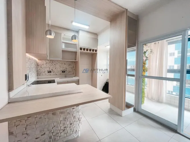 Apartamento à venda em Praia Grande com 1 quarto,1 banheiro, 1 vaga e 53m