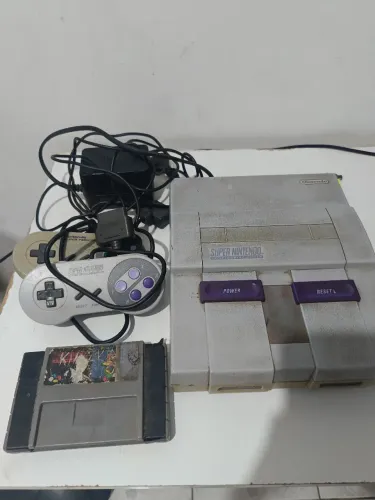 Super Nintendo (1 jogo super Mario + 2 controles )