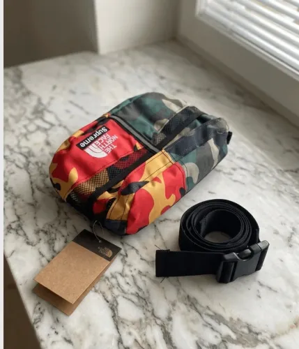 bolsa shoulder bag pochete the north face x supreme nunca usada