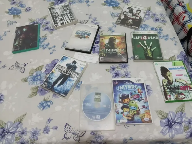 Lote de jogos de Xbox 360 e wii  vendo ou troco por: controles de wii 