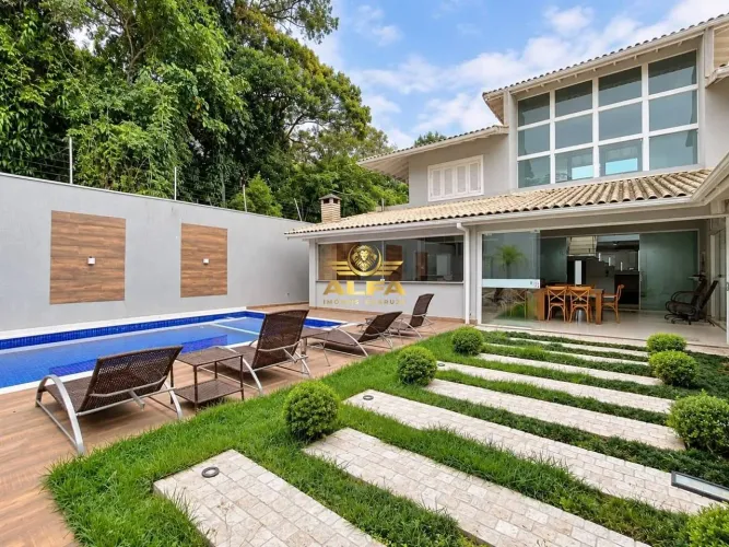 Casa com 5 dormitórios à venda, 376 m² por R$ 2.150.000,00 - Jardim Pernambuco I - Guarujá