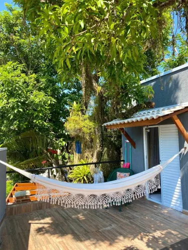 Casa a venda em condomínio fechado a 150 metros da praia de Boiçucanga