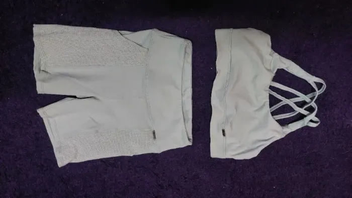 Conjunto de treino: top e short oxinty verde água