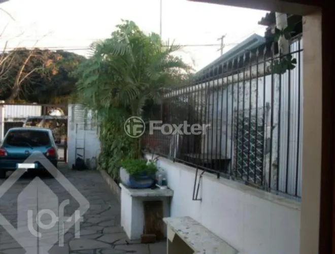Casa à venda Avenida Edgar Pires de Castro, Restinga - Porto Alegre