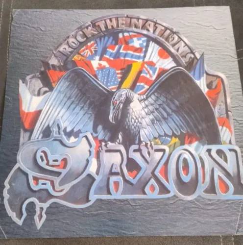lp saxon rock the nations 1986 com encarte/ Leia descriçao