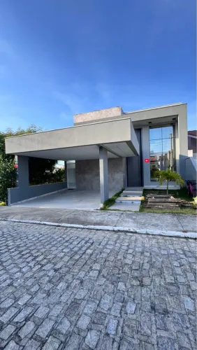 Casa com 5/4 sendo 3 suítes - espaço gourmet - dependência