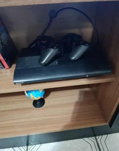 Ps3 com 2 controles e loja de jogos 