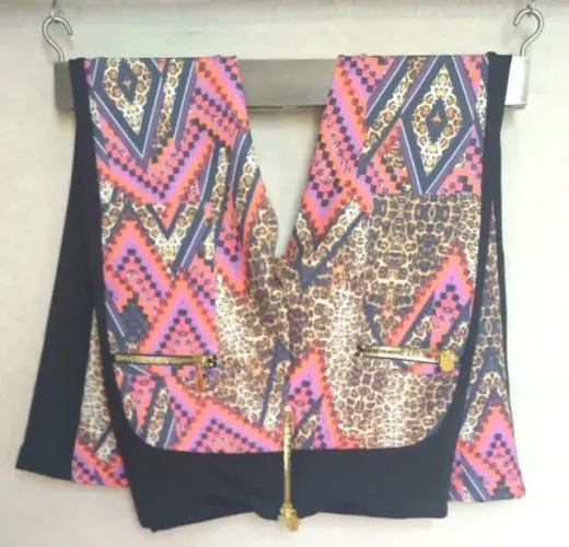 Calça feminina elastano e poliester. Tamanho G. Marca Mellina modelo "flare".