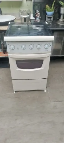 Fogão Dako 4 bocas queimadores , forno ,acendimento tudo funcionando perfeitamente