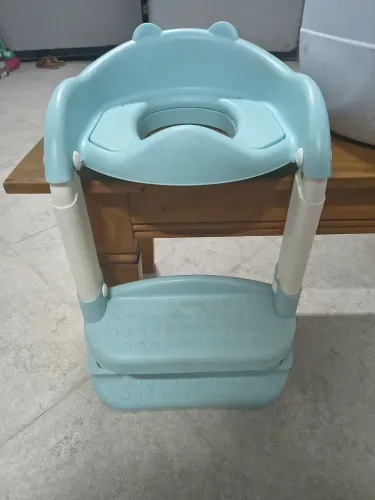 Redutor de assento infantil.