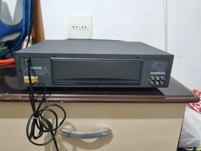 Karaoke com 12 cartucho original + aparelho funciona perfeito