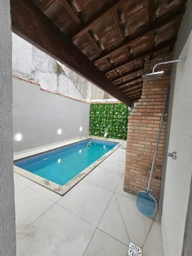 Casa com 2 dormitórios e PISCINA à venda, 90 m² por R$ 680.000 - Mirim - Praia Grande/SP