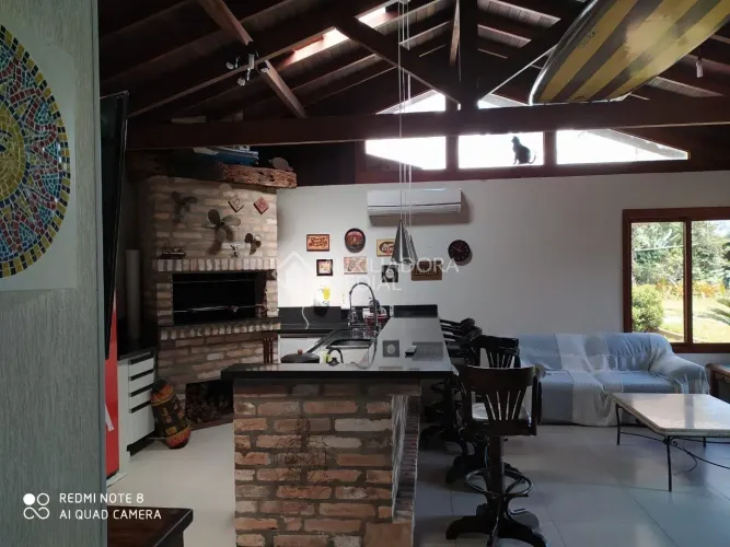 Casa residencial à venda no bairro Arquipélago com 465 m² e 4 dormitórios.