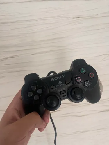 Controle original de ps2 série H com defeito