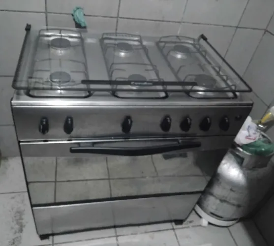 VENDO FOGÃO DE INOX NÃO É ELECTRICO NÃO FAÇO ENTREGA XAMA SÓ QUEM REALMENTE QUER COMPRAR