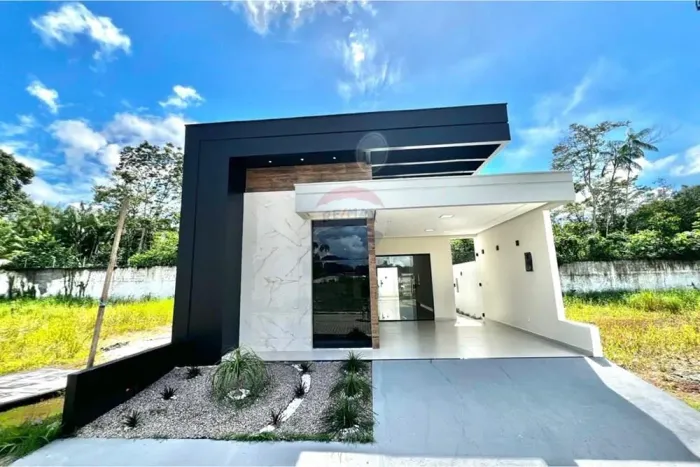 Casa em condomínio fechado com 3/4 sendo duas suítes