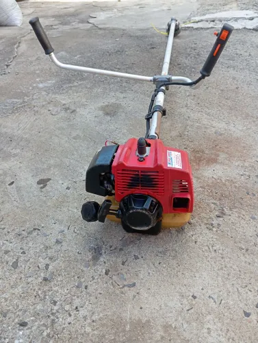 Vendo roçadeira kawashina original motor Mitsubishi 30 cc revisada 