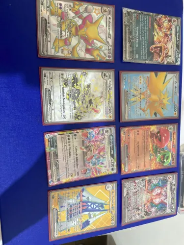 Vende-se coleção carta Pokémon váliosas incluindo brinde