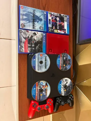 Ps4 1tera, dois controles e 4 jogos.