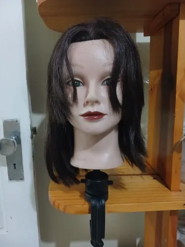 Cabeça de boneca com suporte