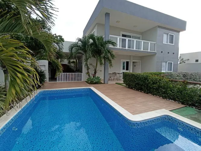 EXCELENTE CASA ALTO PADRÃO 4/4 SENDO 3 SUÍTES COM PISCINA COM HIDRO EM CAIXA D'AGUA LAURO