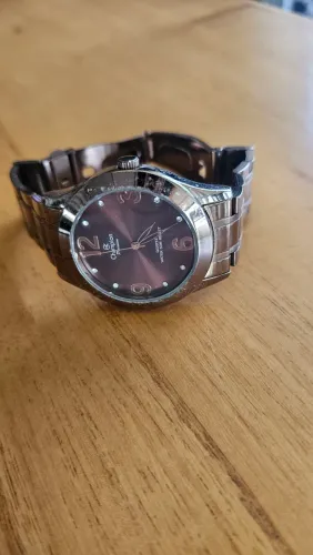 Relogio champion feminino chocolate medio cn29098r<br><br>Usado // colocar bateria <br><br>80