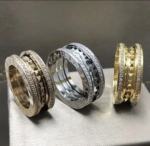 Anel Aliança bvlgari rock fina cravejada de moissanites 