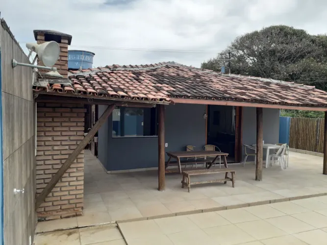 Casa veraneio à 100 mts praia Ar nos dormitórios, piscina, mobiliado, piscina, chu.