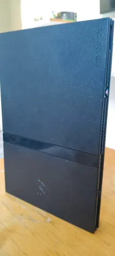 PS2 slim série 79000mil. Com defeito no estado que se encontra 