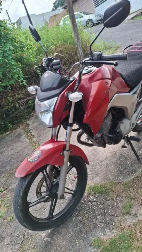 Moto impecável.