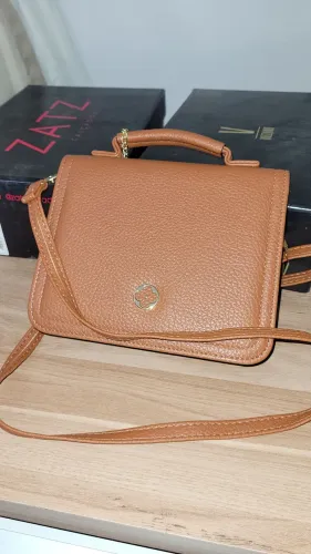 Bolsa nova, média linda e bem versátil .