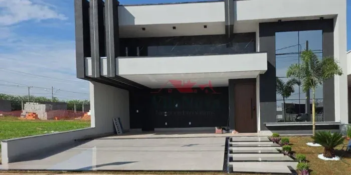 EXCELENTE CASA À VENDA COM 3 SUÍTES, ESCRITÓRIO, ÁREA GOURMET, PISCINA E 4 VAGAS - COND. E