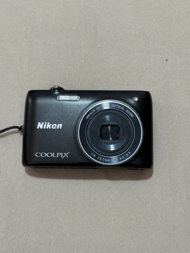 Máquina fotográfica Nikon 5x