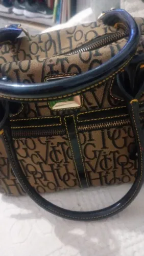Bolsa de mão Victor Hugo original 