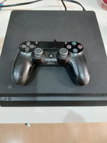 Vendo Ps4 1Tb  versão 12.02 software 