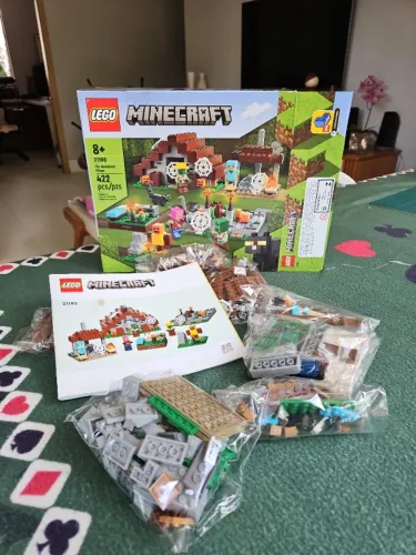 Kit de construção Lego Minecraft The Abandoned Village Modelo 21190