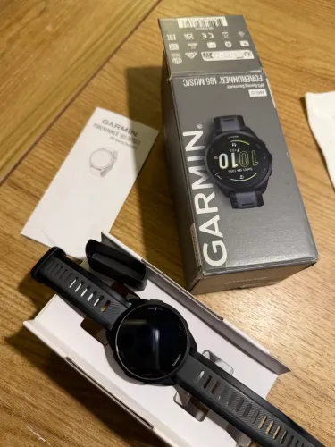 Garmin Forerunner 165 Music AMOLED com caixa e manual