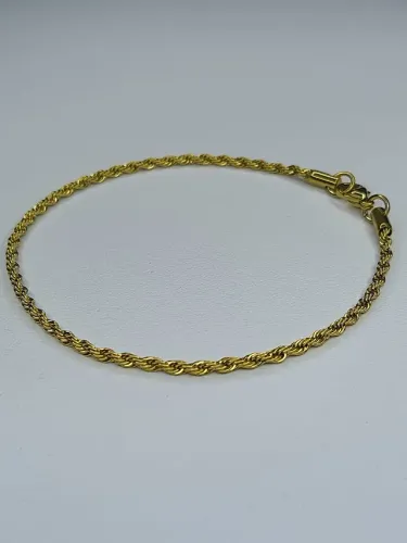 Pulseira dourada trançada