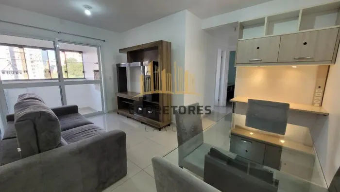 Apartamento 02 dormitórios com sacada com churrasqueira semi-mobiliado para alugar no Cent