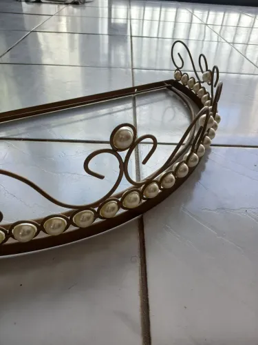 Dorcel dourado com pérolas