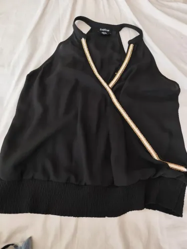 Blusa sem manga, crepe, forrada, coz elástico,der corrente, importada  USA(bebe) Tam G