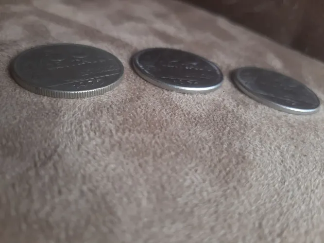 3 tipos de moeda de 1975 de 50 centavos